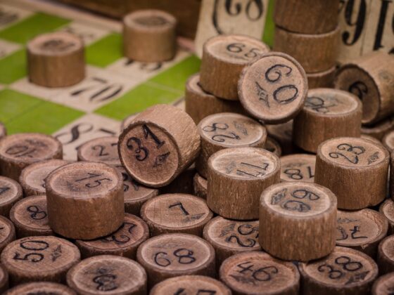 Old wooden bingo chips in a